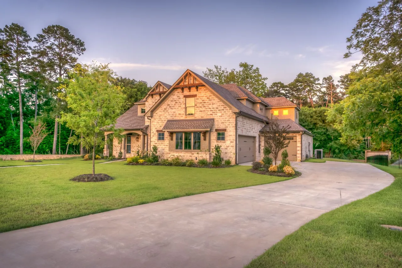 Brick home with a curved driveway